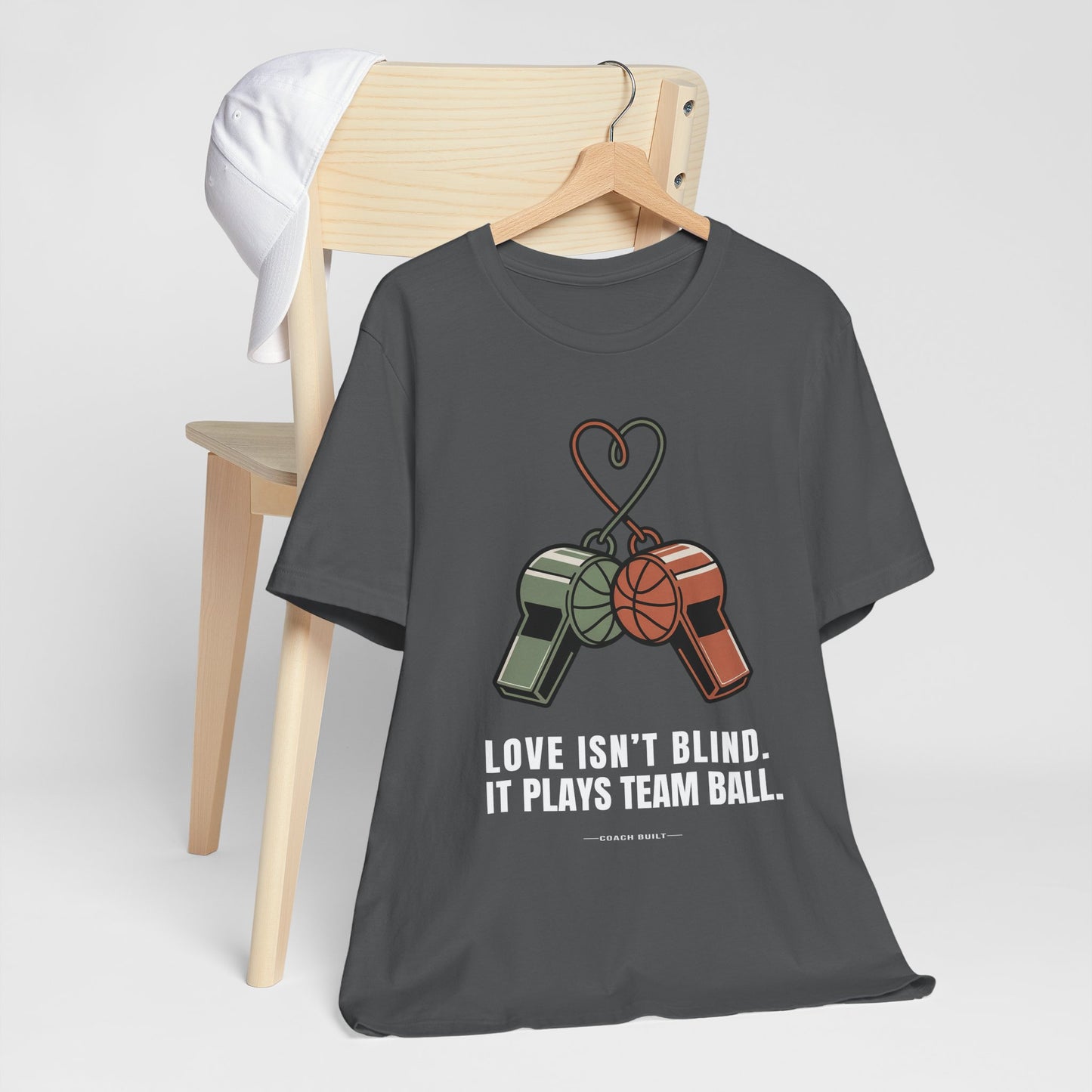 Love Isn’t Blind (white text) — It Plays Team Ball Tee
