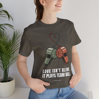 Love Isn’t Blind (white text) — It Plays Team Ball Tee