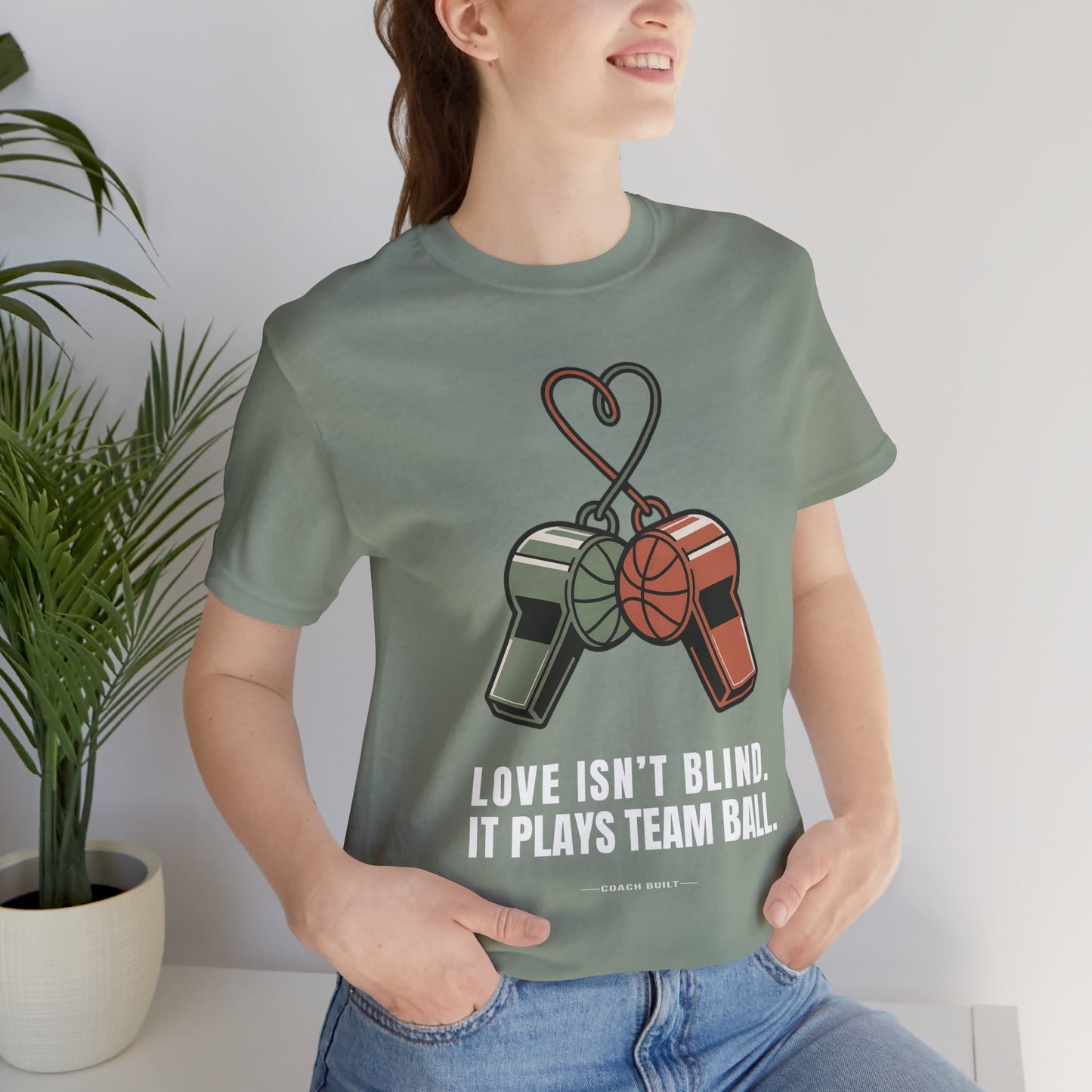 Love Isn’t Blind (white text) — It Plays Team Ball Tee